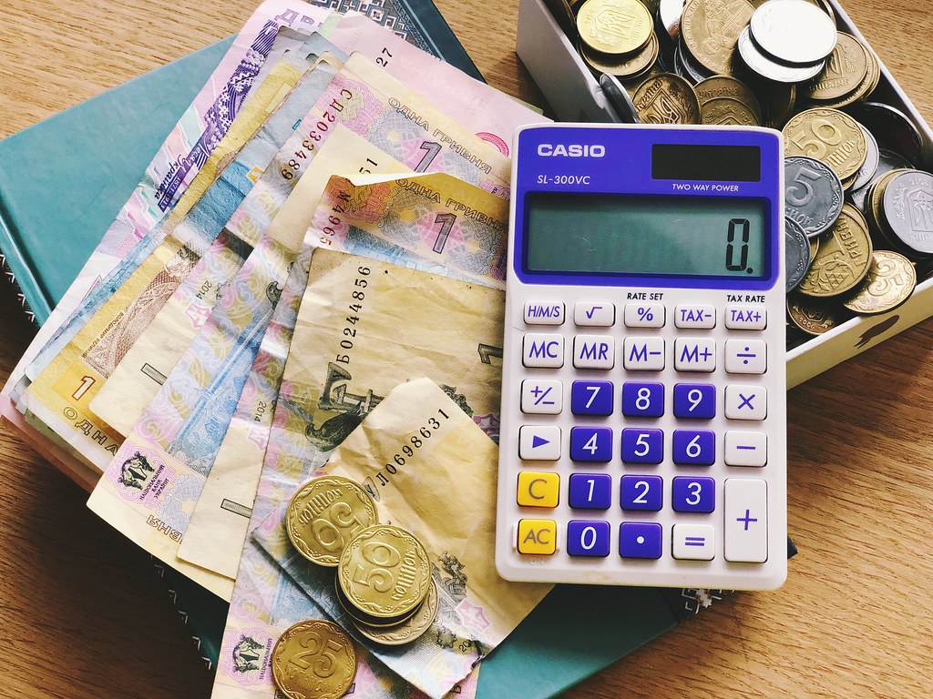 A notepad with calculations