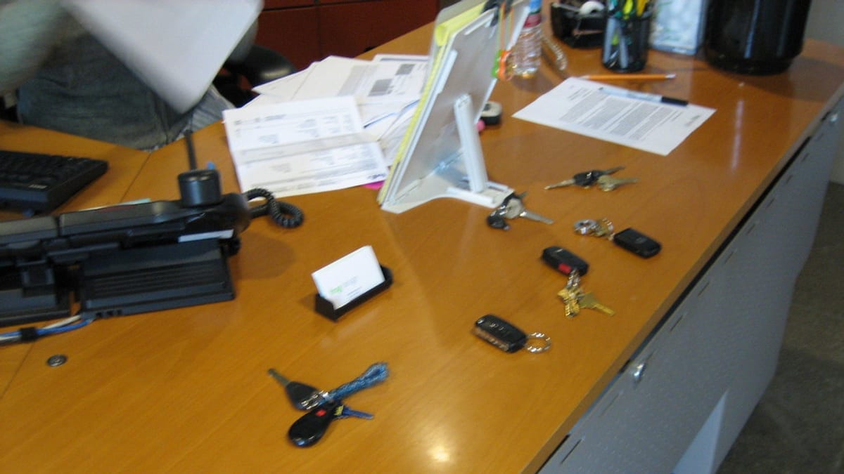 Car keys on an office desk