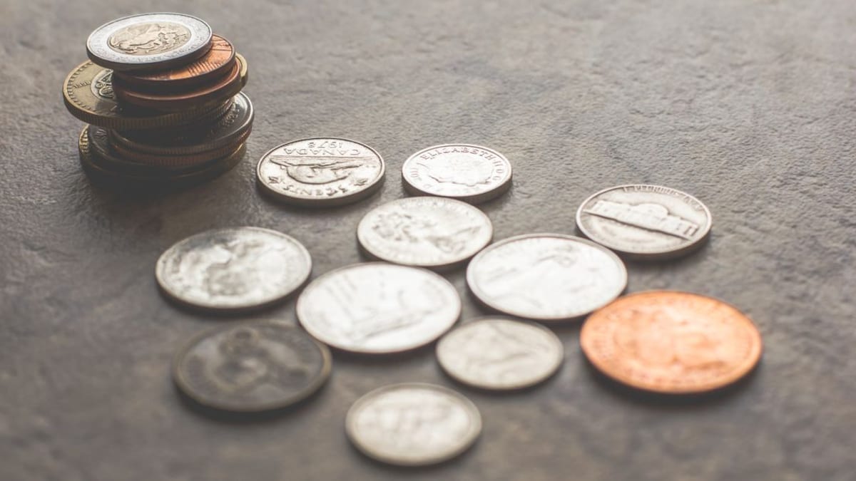 Coins stacked in growing piles