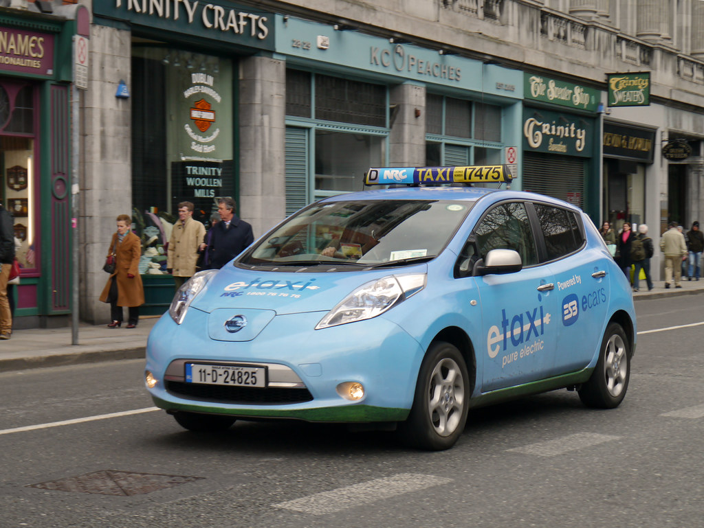 An electric car charging at home