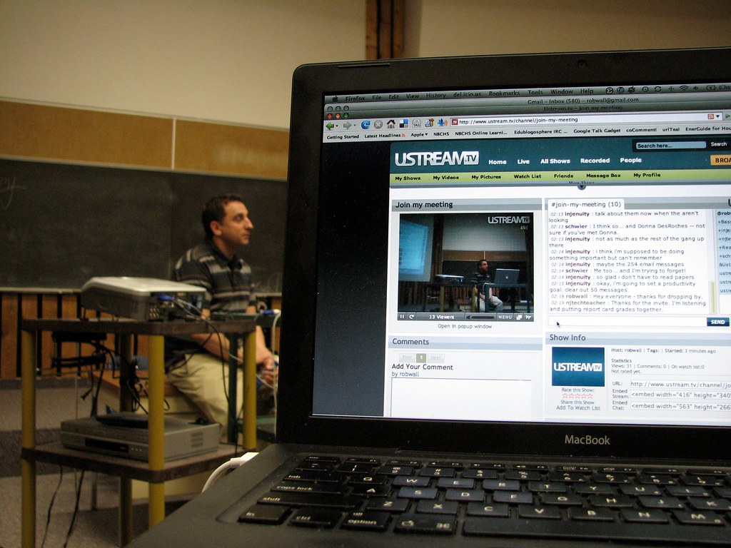 A laptop showing a chat conversation