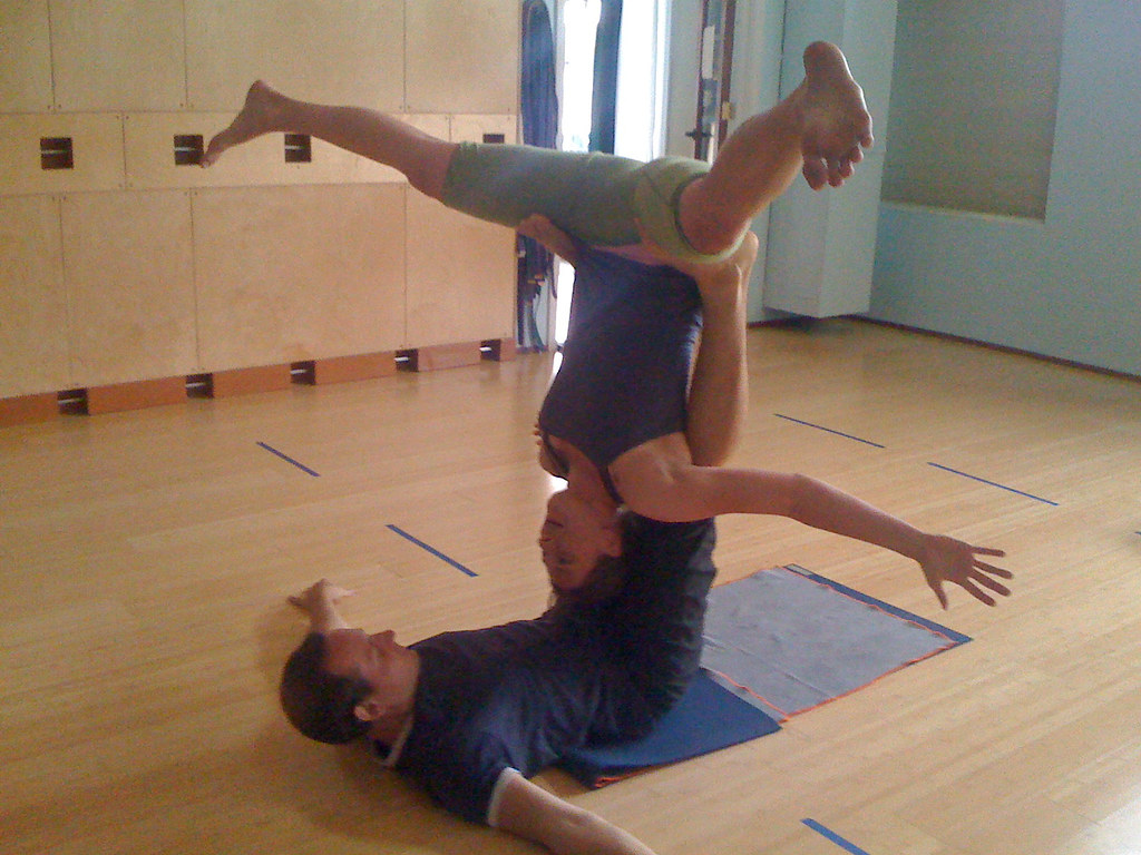 An exercise mat on a wooden floor