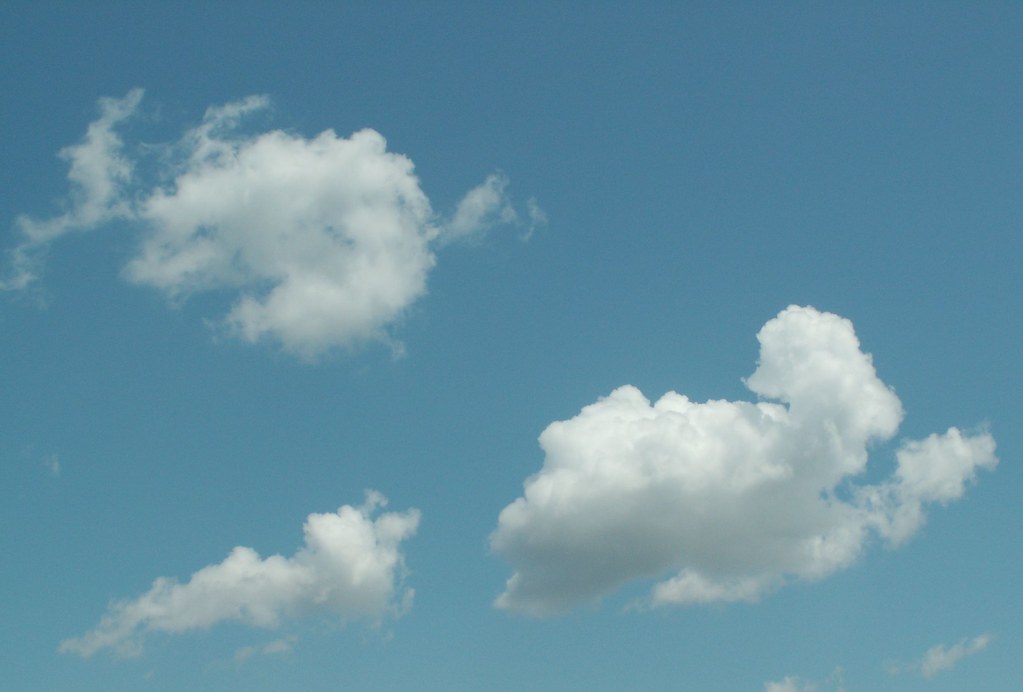 A clear blue sky above an open horizon